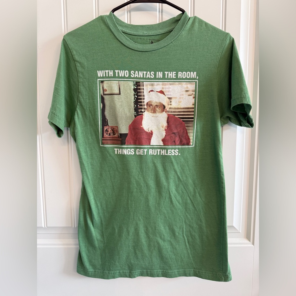 The office Christmas shirt size adult unisex small.  Tiny pin hole see pic.